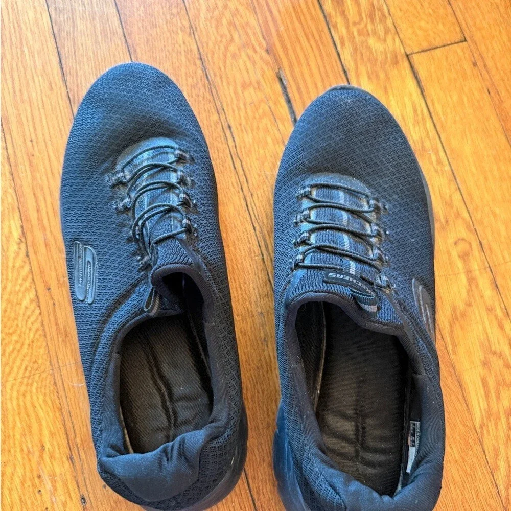 Skechers women’s Black Slip-On Mesh Walking Shoes